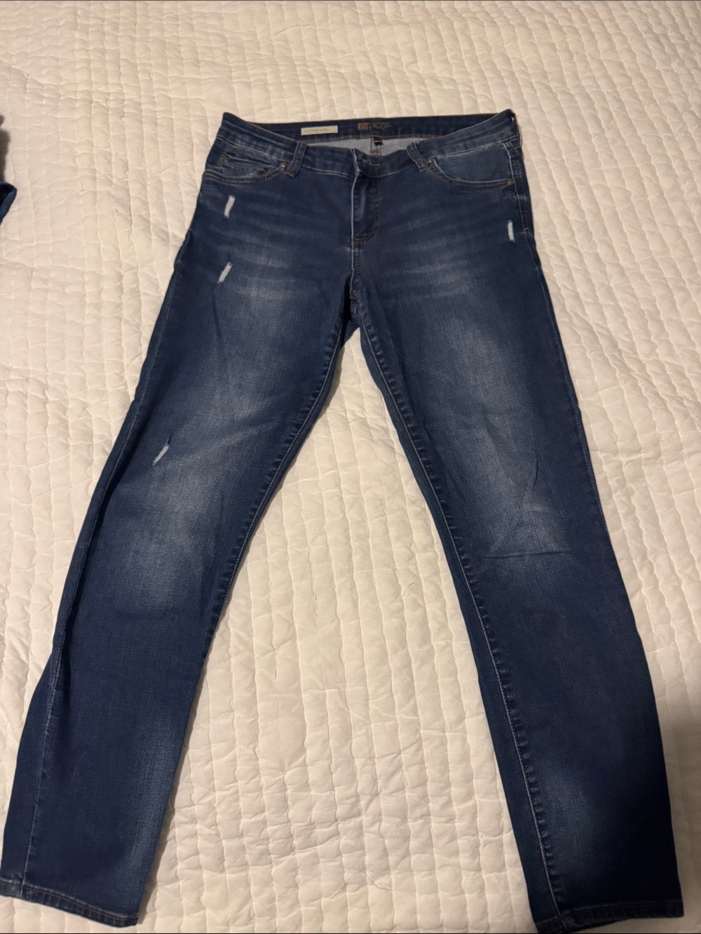 Kut from the Kloth “Toothpick Skinny” Indigo Skinny Jeans with Light Distressing